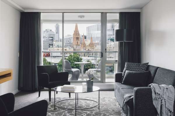 QuayWestMelbourne-2 Bedroom Deluxe Suite - City & River View Living Room.jpg